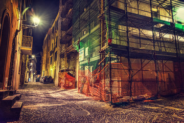 Scaffolding in an old facade in Alghero - Powered by Adobe