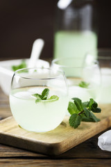 Summer cocktail with rum, ice and mint