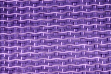 Purple Close up image of black dash mat with grid cells