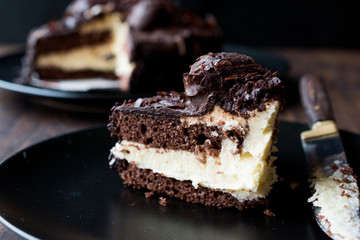 Chocolate Profiterole Cake on Black Plate