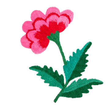 Embroidery pattern of flowers handmade smooth thread of floss on white background isolate with copy space flat view from above