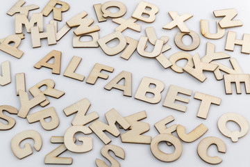 The word alphabet in Dutch translation in wooden letters.