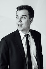 Portrait of handsome stylish man in elegant suit