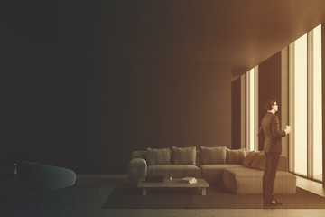 Gray living room interior, man, toned