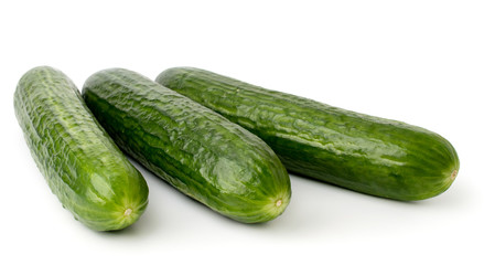 Three ripe cucumber on white background, isolated.