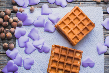 Homemade waffles on a wooden background hearts, purple, Valentine's day