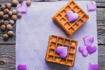 Homemade waffles on a wooden background hearts, purple, Valentine's day