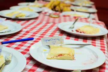 children cook a cheese patty with their own hands