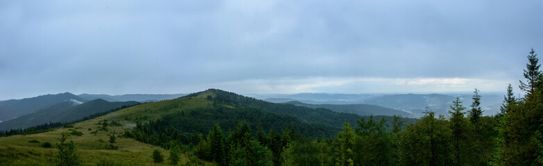 Fototapeta na wymiar Amazing panorama on the mountain Yavorinka in the Carpathians during the rain