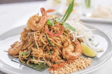 Pad Thai with shrimp on a white plate