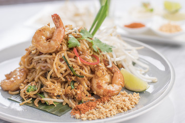 Pad Thai with shrimp on a white plate