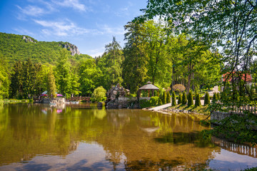 Fototapeta na wymiar Park with a lake in the spa town Rajecke Teplice in Slovakia, Europe.