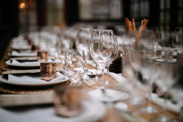 Set tables for fancy dinner in a green house
