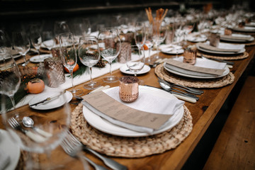 Set tables for fancy dinner in a green house