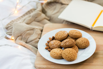 oatmeal cookies with almonds on plate at home