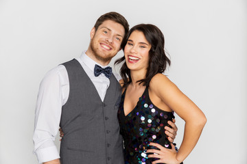 happy couple hugging at party