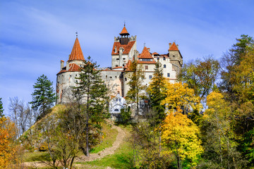 Fototapeta na wymiar Bran Castle, Brasov, Transylvania, Romania. Autumn landscape with fortress at the border between Wallachia and Transylvania.It is also known for the myth of Dracula.