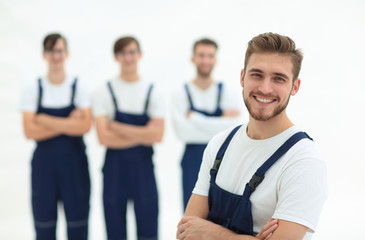 Cheerful team of responsible movers isolated on white background