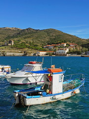 Fototapeta na wymiar Small fishing boat in Port-vendres harbor, Vermilion Coast, Pyrenees Orientales, Roussillon, France