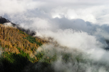Over the clouds in high mountains, Pyrenees, foggy and cloudy