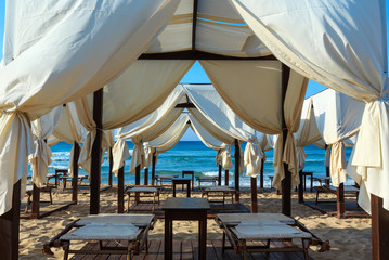 Fototapeta na wymiar Beach canopies, Salento, Pescoluse, Italy