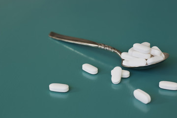 A Spoon Full of White Pills