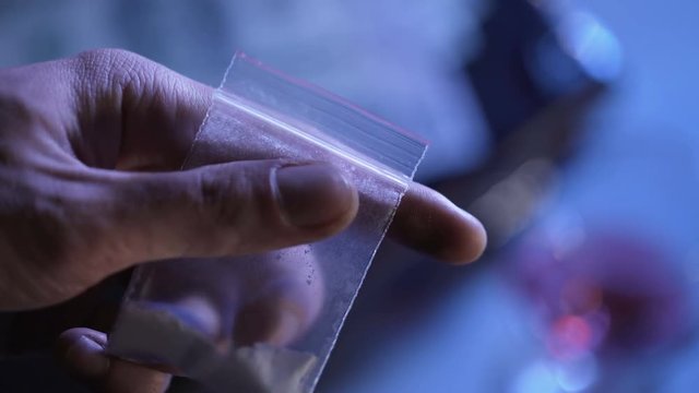 Provider checking white powder, pharmaceutical industry, illegal drug trade