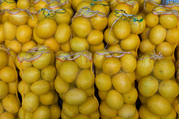 Bags with melons for sale at the fair