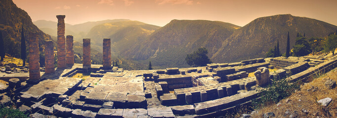 Panoramic view of Apollo's temple in the famous archaeological site of Delphi in Greece which was...