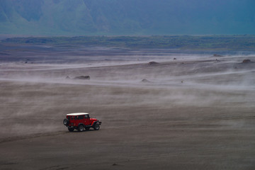 Obraz na płótnie Canvas BROMO, INDONESIA - 2ND MAC 2014 - A classic and easiest way to do Bromo Tengger Semeru National Park was by jeep ride. Just sit on jeep along the way go roaming the misty fog at Pasir Berbisik.