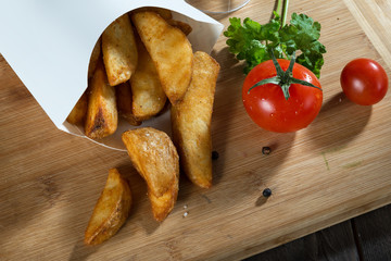 Large delicious burger/ Large delicious heavy burger with two cutlets an abundance of cheese sauce and vegetables