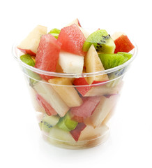 fresh fruit pieces salad in plastic cup