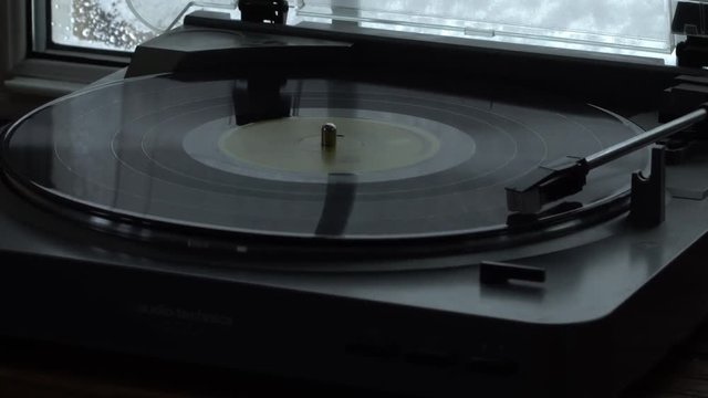 Vinyl record spinning and playing at normal speed