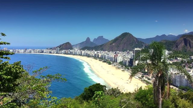 Scenic overlook view of Copacabana Beach and the city skyline on a clear bright morning in Rio de Janeiro, Brazil