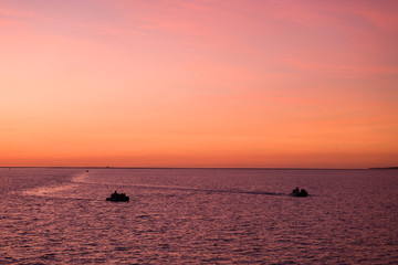 boat on the ocean at sunset, Montgomery Reef