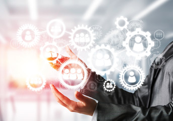 Cogwheels and gears mechanism as social communication concept