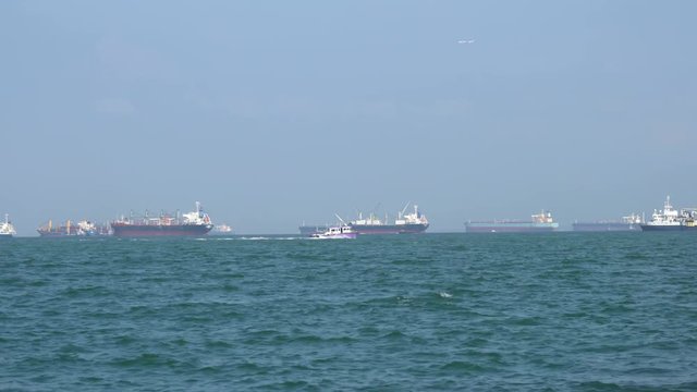 Cargo ships floating on the sea