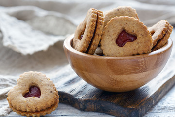 Homemade Linzer cookies with strawberry jam.