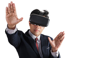 Portrait of businessman in a suit with virtual reality glasses on his head isolated on background
