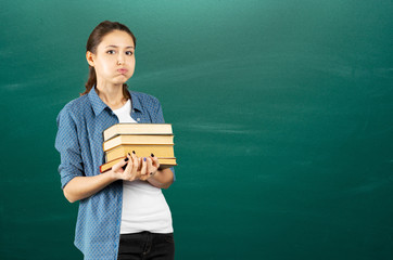 student with books in hands