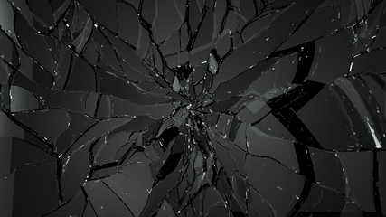 Pieces of cracked glass on black
