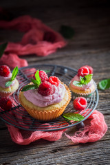 Raspberry muffin made of cream and fresh fruits