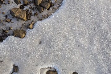 Beautiful white ice surface with frost crystals in a sunlight
