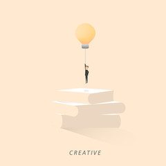 Businessman holding the light bulb on top of books. Flat design concept of creativity, success, acknowledgement and ambition. Vector illustration.