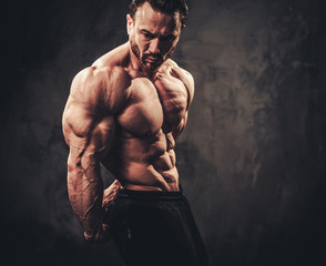 Man showing his muscular body
