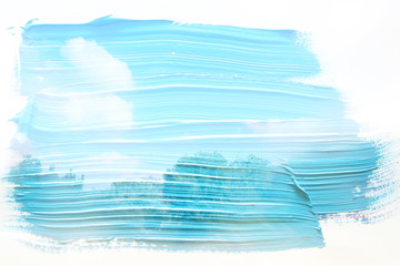 dreamy and abstract image of the blue sky with white clouds. double exposure effect with watercolor brush stroke texture.