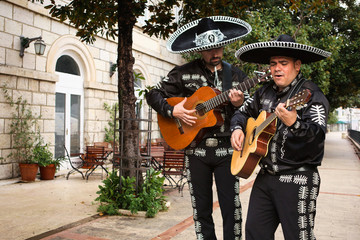 Mexican musicians mariachi on a city street