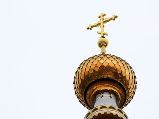 Fototapeta na wymiar The Golden dome and the cross, Christianity
