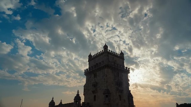 Backlit ultra wide angle shot of the Manueline 16th century Torre de Belem tower in Lisbon, Portugal. The monument is a UNESCO World Heritage Site.