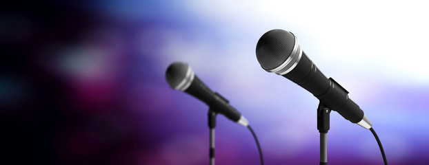Microphones on stands on blue blur background, banner. 3d illustration © Rawf8